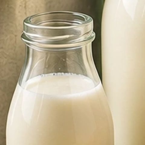 A glass bottle of buffalo milk